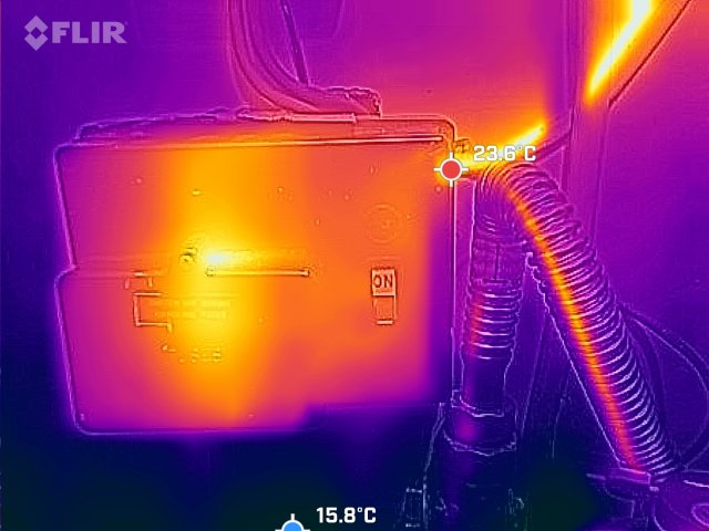 Thermal image of an old home mains consumer unit with one warm fuse